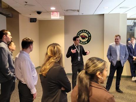 Master of Business in 体育管理s students at the Xcel Energy Center, home of the Minnesot...