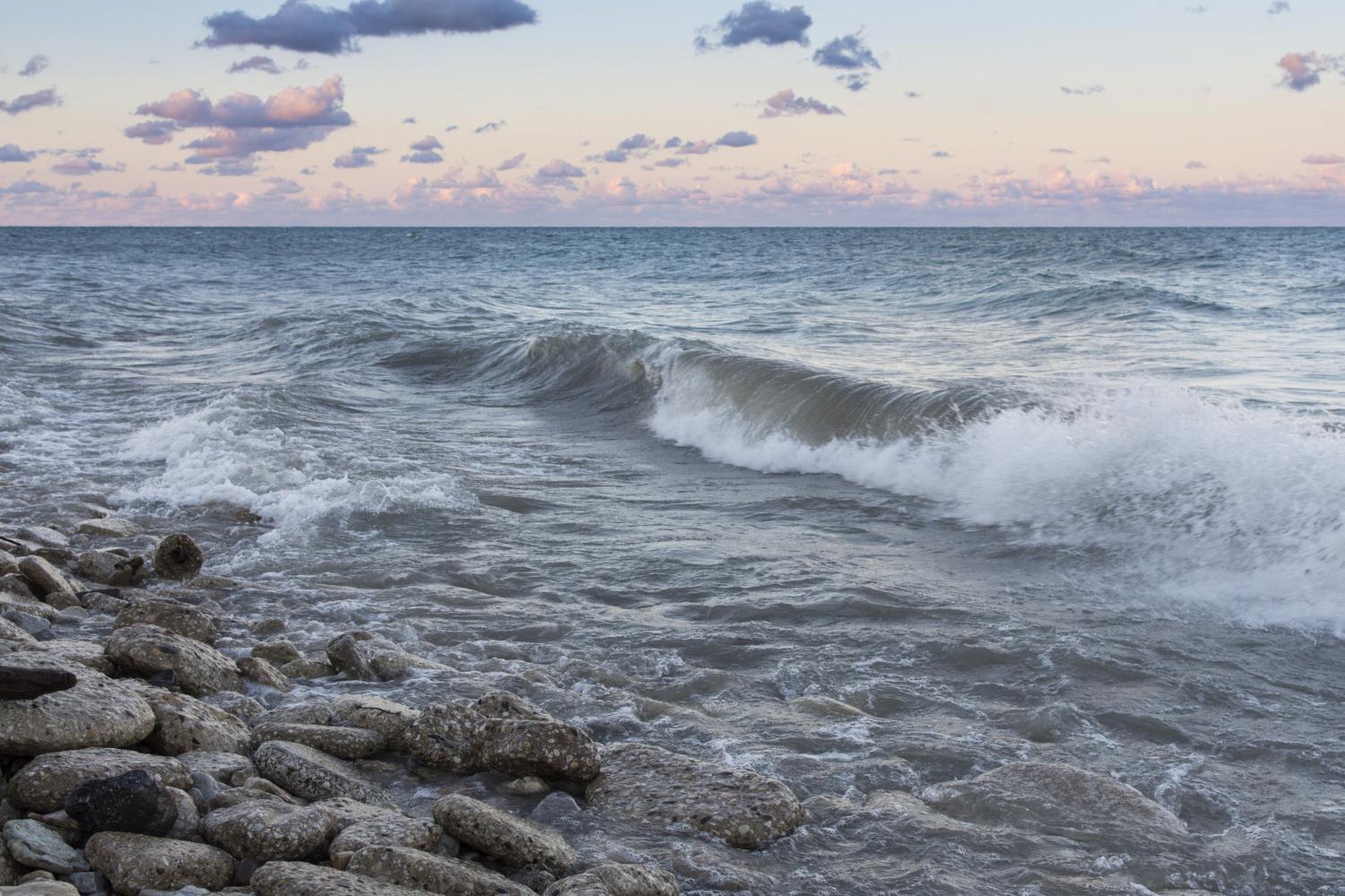 The sun rises over Lake Michigan on the <a href='http://rok9.xuemi.net'>BETVLCTOR伟德登录</a> campus.